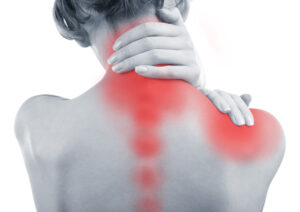 Personal Injury Lawyer In New Orleans, LA - Young woman with neck and shoulder pain close up